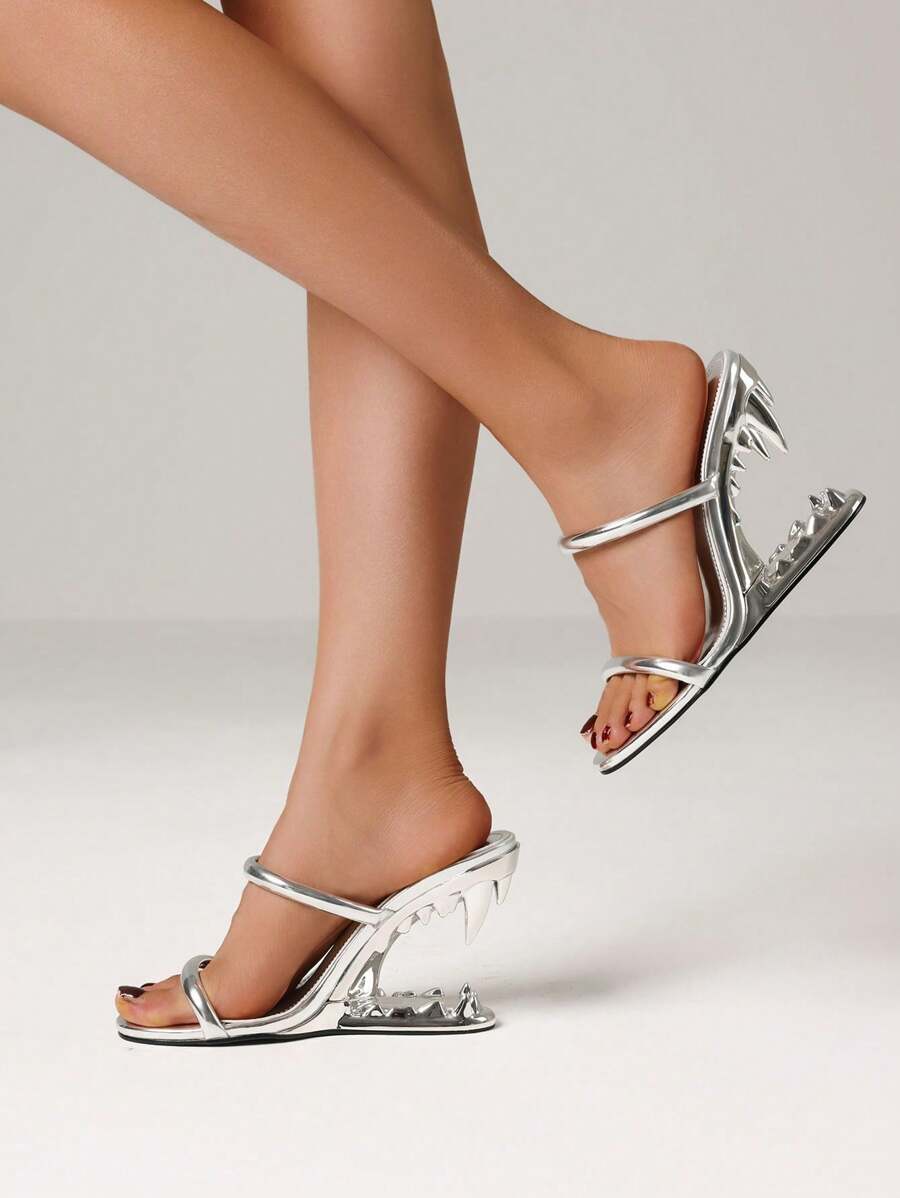 Step out in style with these Chic Metallic Open-Toe Wedge Mules! Perfect for parties or a night out, their shiny finish and high wedge heel add a fun, trendy vibe to any outfit. Slip them on easily and enjoy a comfortable lift that keeps you dancing all night long. These mules are your go-to for turning heads with a playful sparkle!