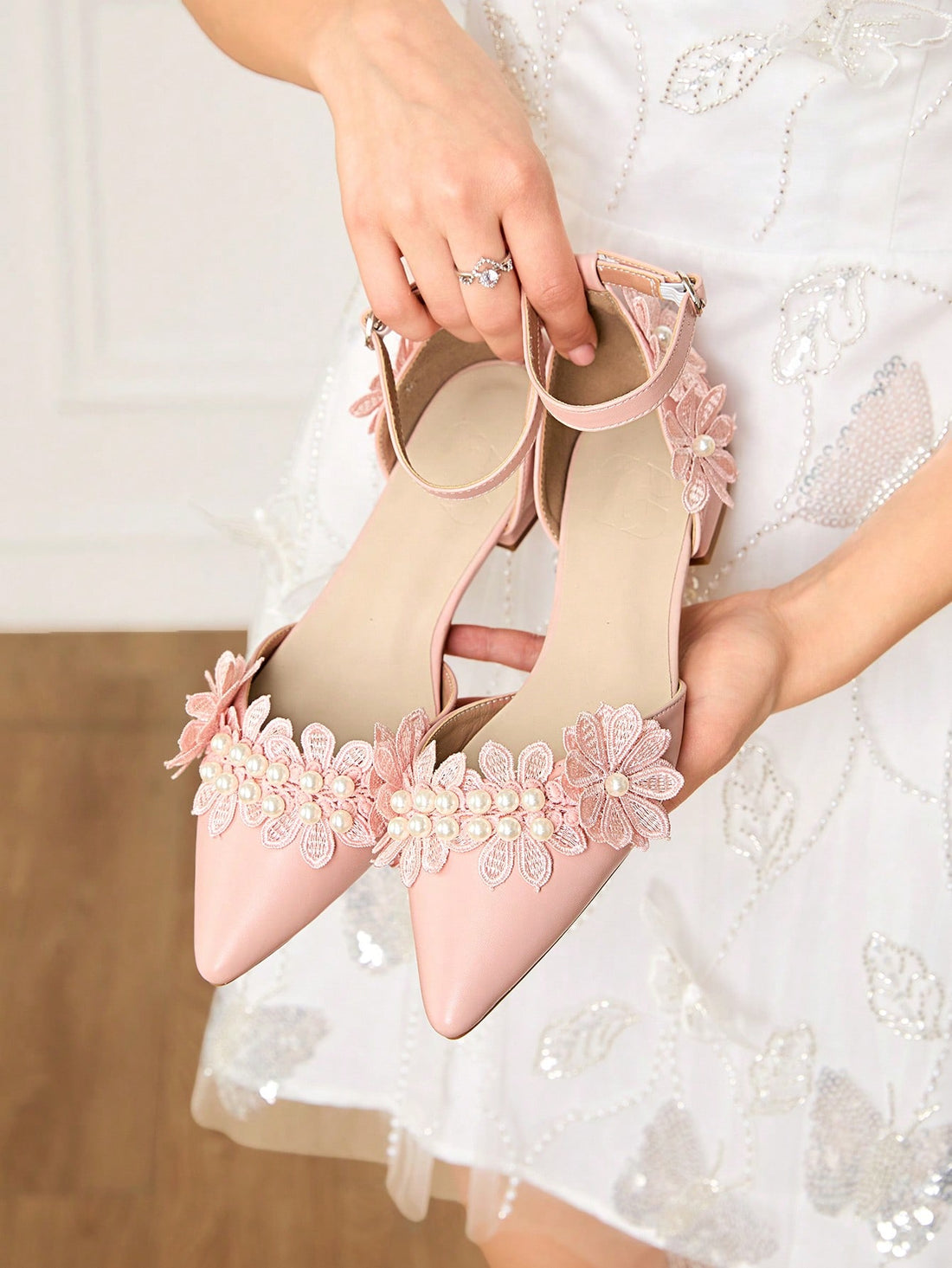 Step into elegance with these Chic Pink Pearl Flower Ballet Flats, designed to add a playful touch to your wedding or party outfit. Soft pink hues combined with delicate pearl flower accents create a charming look that’s both comfortable and stylish. Perfect for dancing the night away or making a graceful entrance, these flats bring a fun, feminine flair to any special occasion.