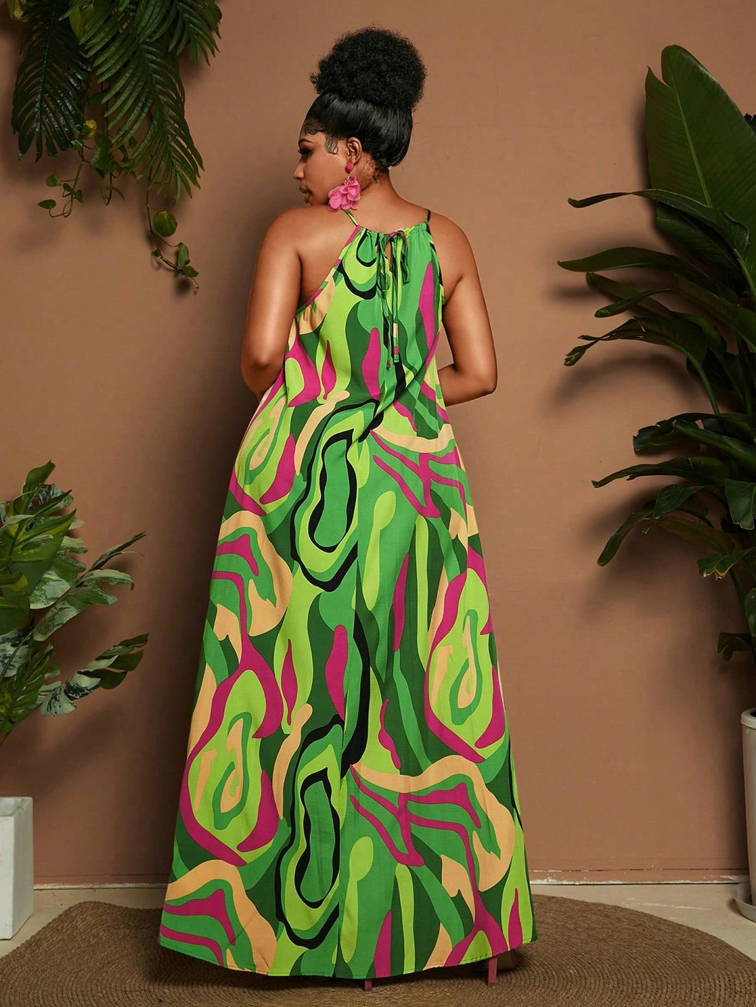Swing into style with our Plus Size A-Line Dress! The playful line pattern adds a dash of visual fun while spaghetti straps keep things breezy. This flirty silhouette flatters your curves in all the right places - perfect for sunny days, vacation vibes, or whenever you want to feel fabulous without trying too hard!