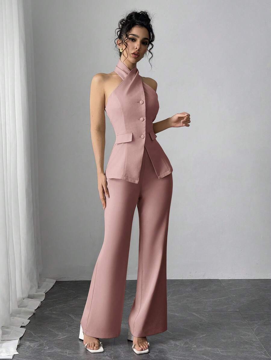 Turn heads this season with our effortless two-piece set that perfectly blends edge and elegance. The backless halter top features a daring cutout design that's Instagram-worthy, while the flowing long pants keep things polished and put-together. Whether you're heading to brunch, the office, or a night out, this set delivers that coveted "I woke up like this" vibe without the effort. Mix, match, or wear together—versatility never looked so good.
