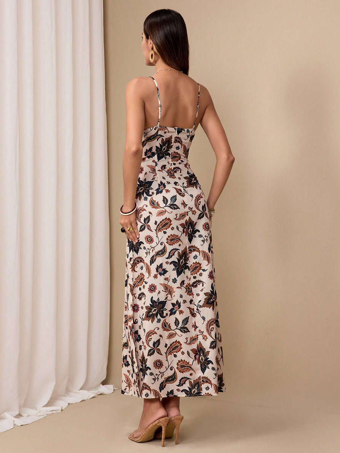 Get ready to turn heads this summer with our Women's Elegant All-Over Print Hollow Camisole Dress! This chic dress combines an all-over print design with a stylish hollow camisole for a stunning and unique look. Perfect for any summer occasion, this dress will have you feeling confident and stylish.