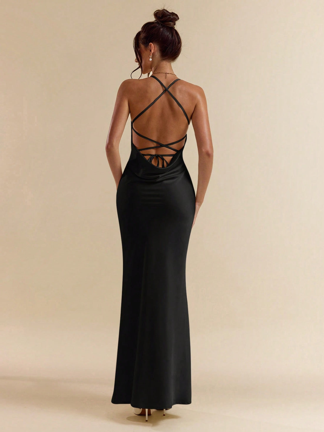 Turn heads at any special occasion with this Elegant Apricot White Satin Backless Tie-Up Dress. Perfect for weddings, vacations (and maybe even crashing a few weddings), this dress will make you feel like a million bucks. With its sleek satin material and unique tie-up back, you'll be the center of attention in the most elegant way possible.