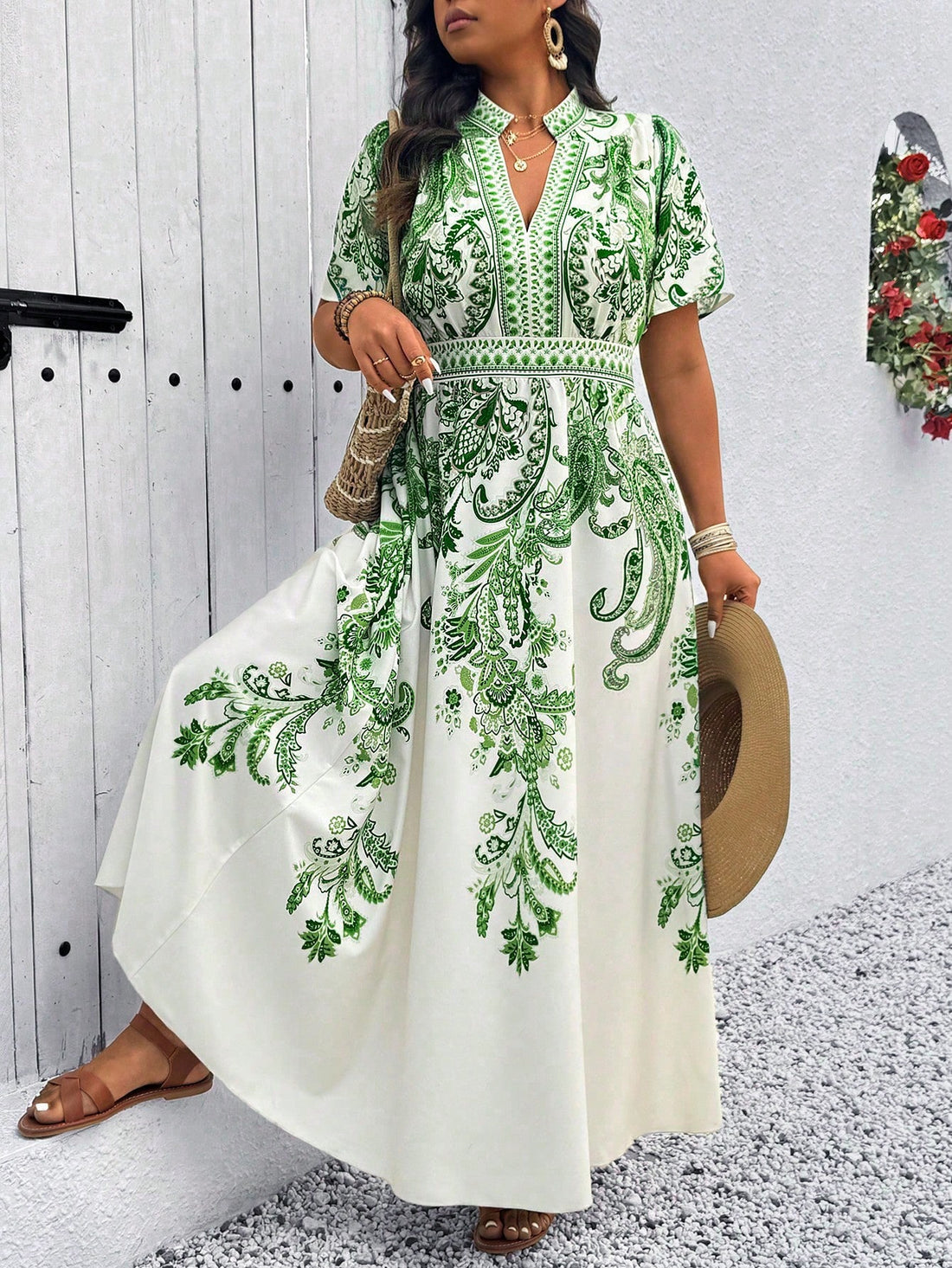 Step into summer with this playful plus size midi dress, featuring a fresh green and white floral pattern that brightens any day. Its flattering cut offers comfort and style, making it perfect for effortless outings or garden parties. Embrace easy elegance and let your vibrant personality bloom in this charming dress.