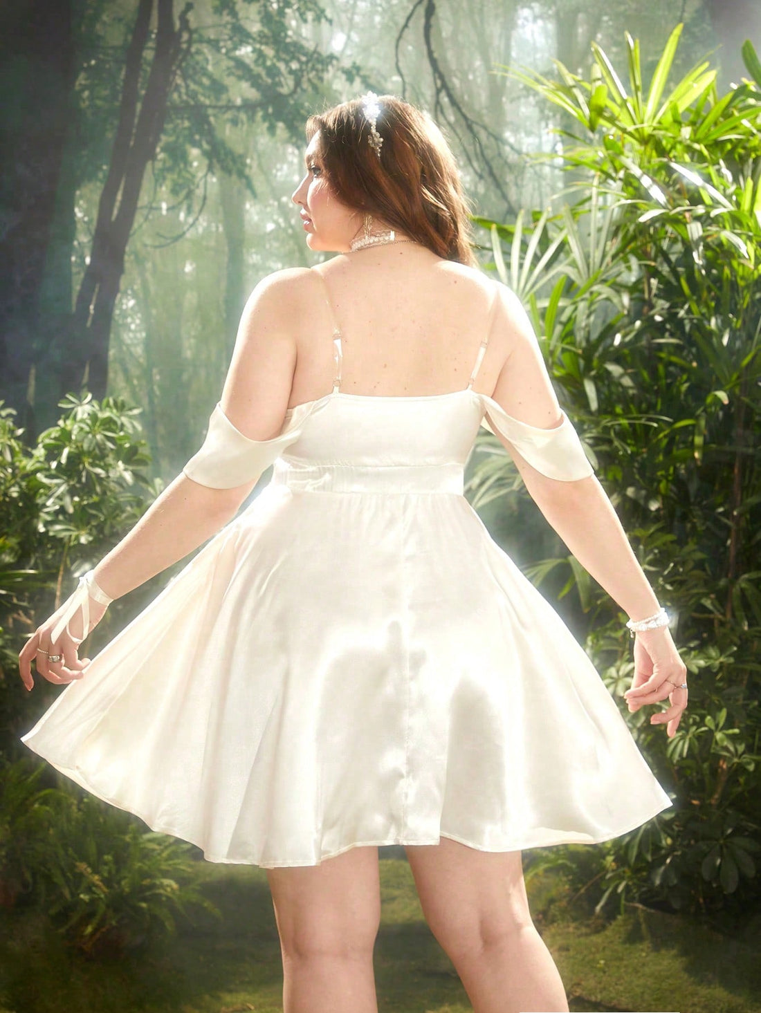 Embrace your inner French maiden with this elegant off-shoulder mini dress! Designed for chic comfort, its plus size fit adds a touch of versatility, while the off-shoulder style exudes a playful and flirty vibe. Perfect for any occasion, this dress will have you feeling confident and stylish all day long.