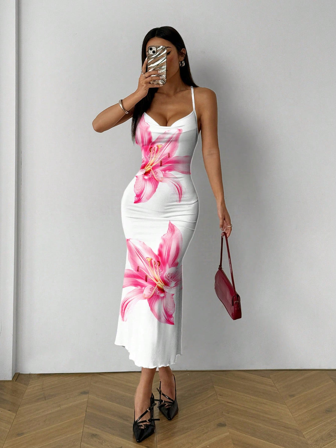 Get ready for summer with this elegant and vibrant Floral Print Draped Neck Sleeveless Midi Dress. Made for women who love to stand out, this dress is perfect for any occasion. Stay cool and stylish all summer long!