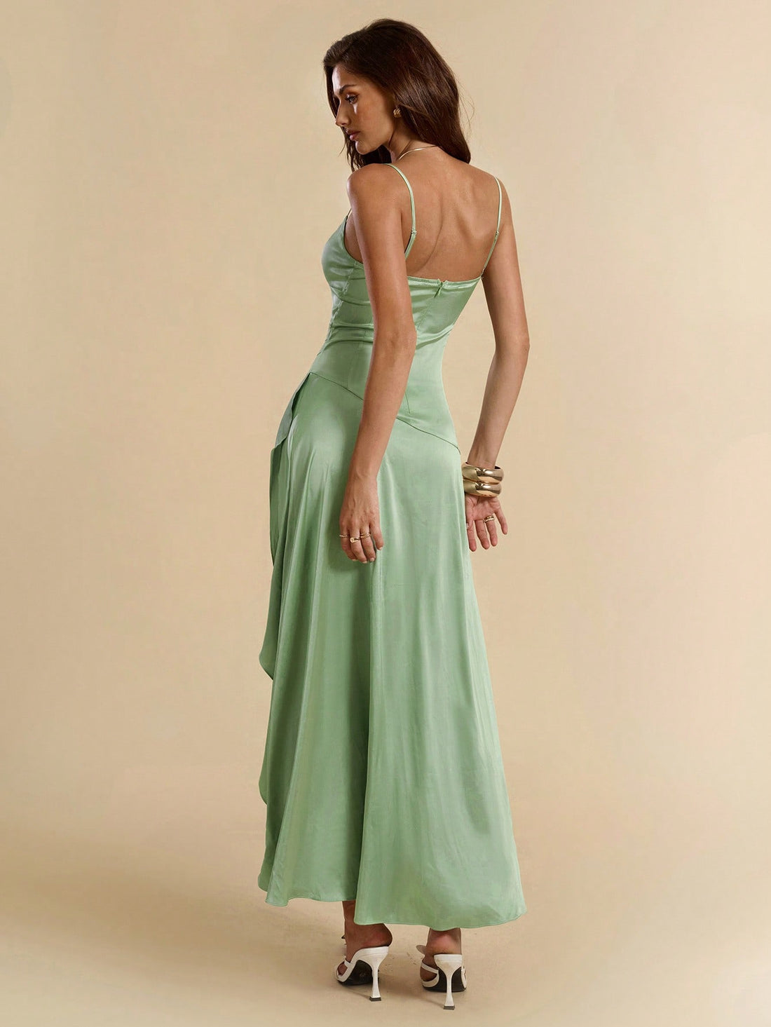 Get ready to slay at your next prom or graduation with our Elegant Satin Cami V-Neck Dress! The high slit adds a touch of glamour, while the lightweight satin material will make you feel like a princess. Be the envy of all in this perfect dress!