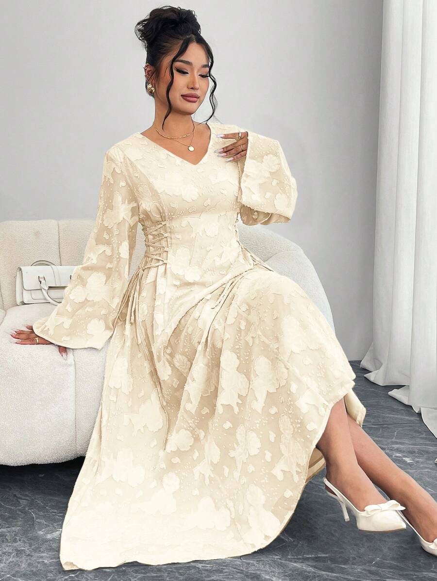 Step into charm and comfort with this Elegant Plus Size Solid Color Dress. Featuring playful cut-outs and flared sleeves, it brings a fun twist to sophistication. The cross tie waist highlights your silhouette while adding a flirty touch. Perfect for making every occasion effortlessly stylish!