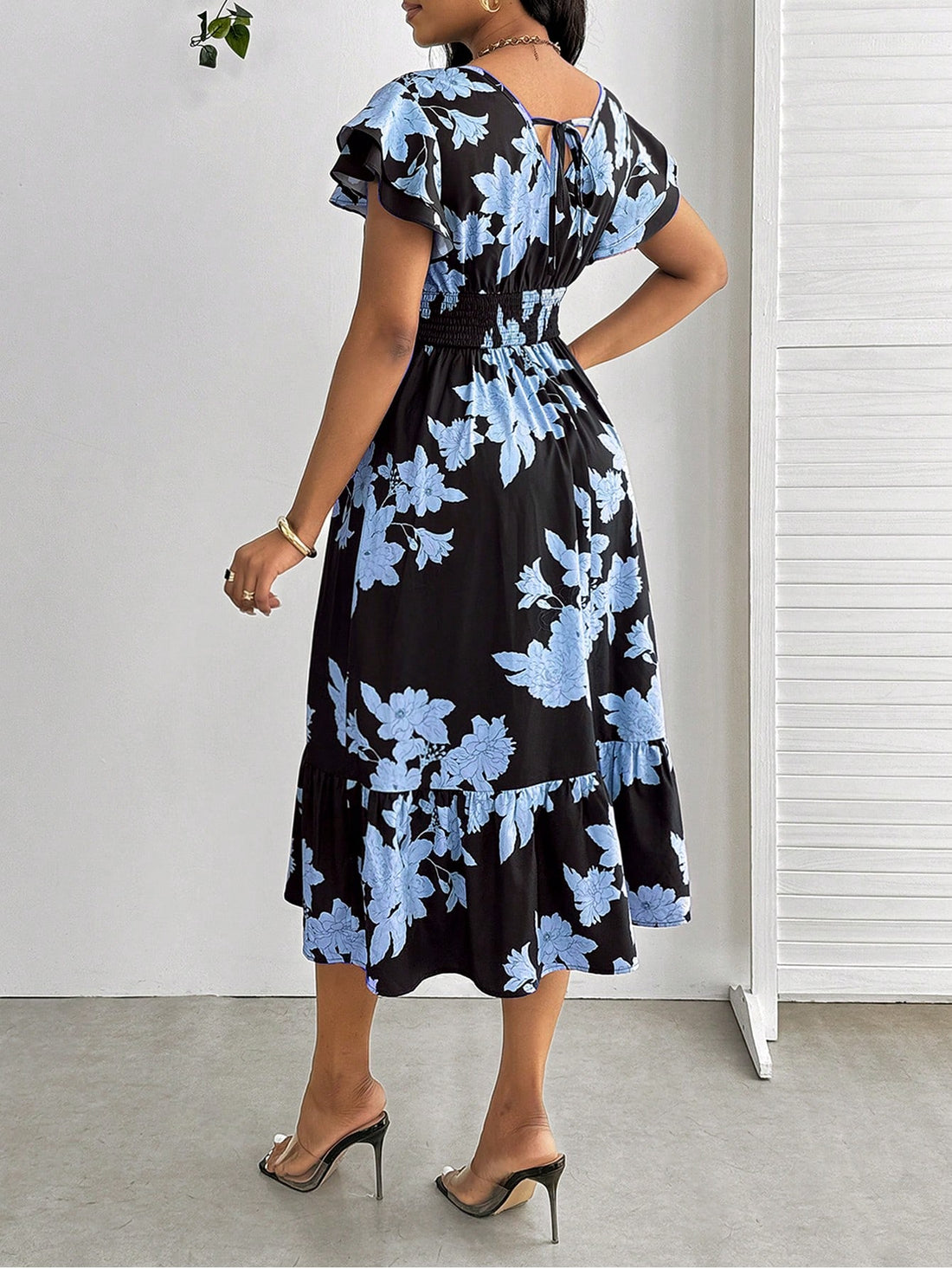 Introducing our Elegant Floral Print Wedding Guest Dress! With delicate lotus leaf sleeves and a versatile design, this dress is perfect for any special occasion. The elegant floral print adds a touch of femininity, making you the best dressed guest. (Weddings, parties, D&D, you name it)!