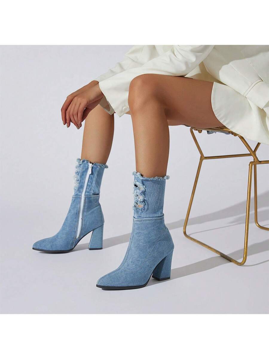 Step up your style game with these chic women's denim ankle boots! Featuring chunky high heels for a bold look and a convenient side zipper for easy wear, they’re perfect for adding a trendy twist to any outfit. Whether you're dressing up or keeping it casual, these boots bring playful flair and confident vibes to your wardrobe.