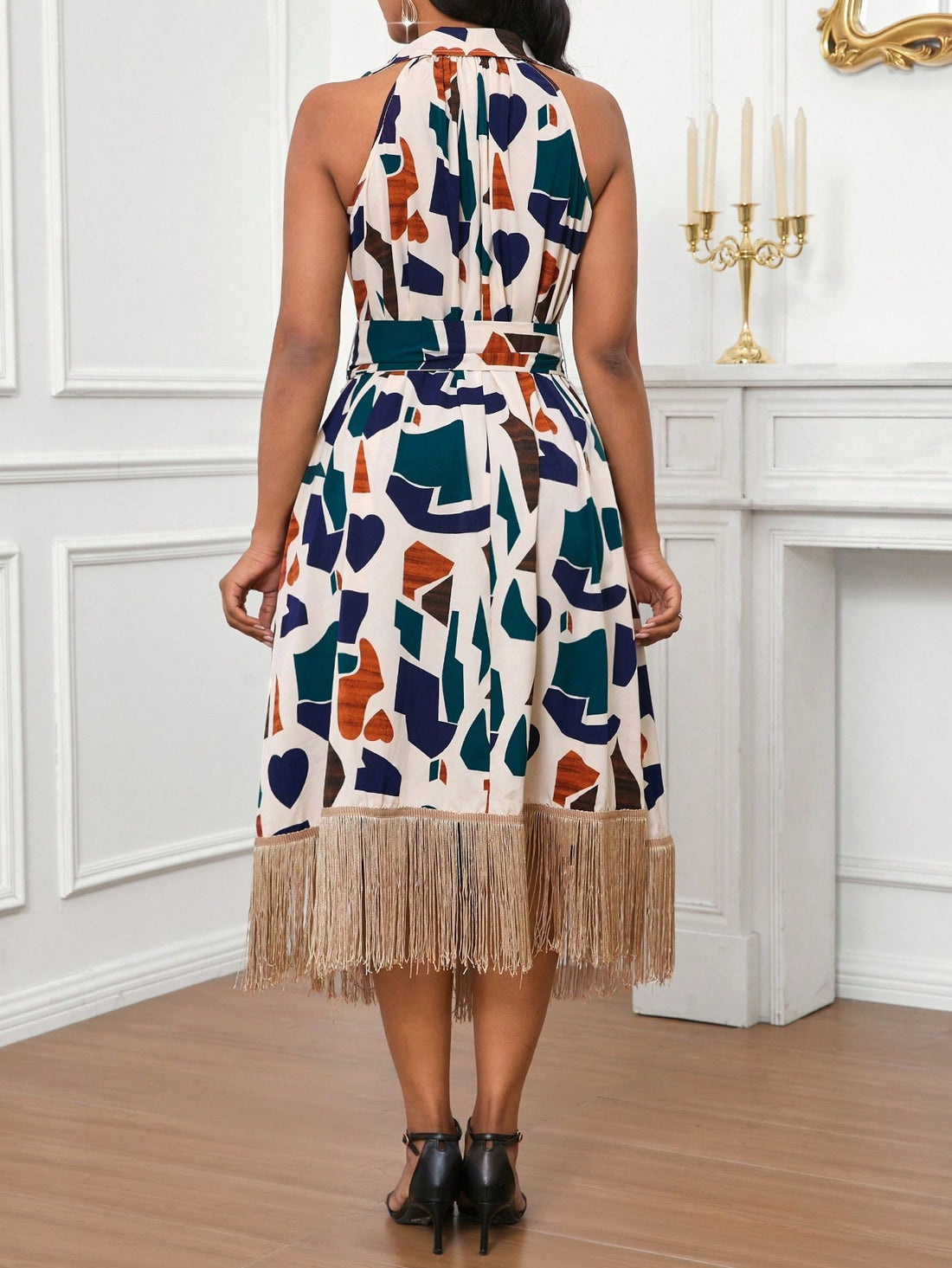 Unleash your inner fashionista with our Chic Geometric Print Tassel Hem Dress. The playful tassel trim adds a touch of flair to this stylish mid-length dress. Perfect for any occasion, this sleeveless dress will make you stand out in a chic and unique way.