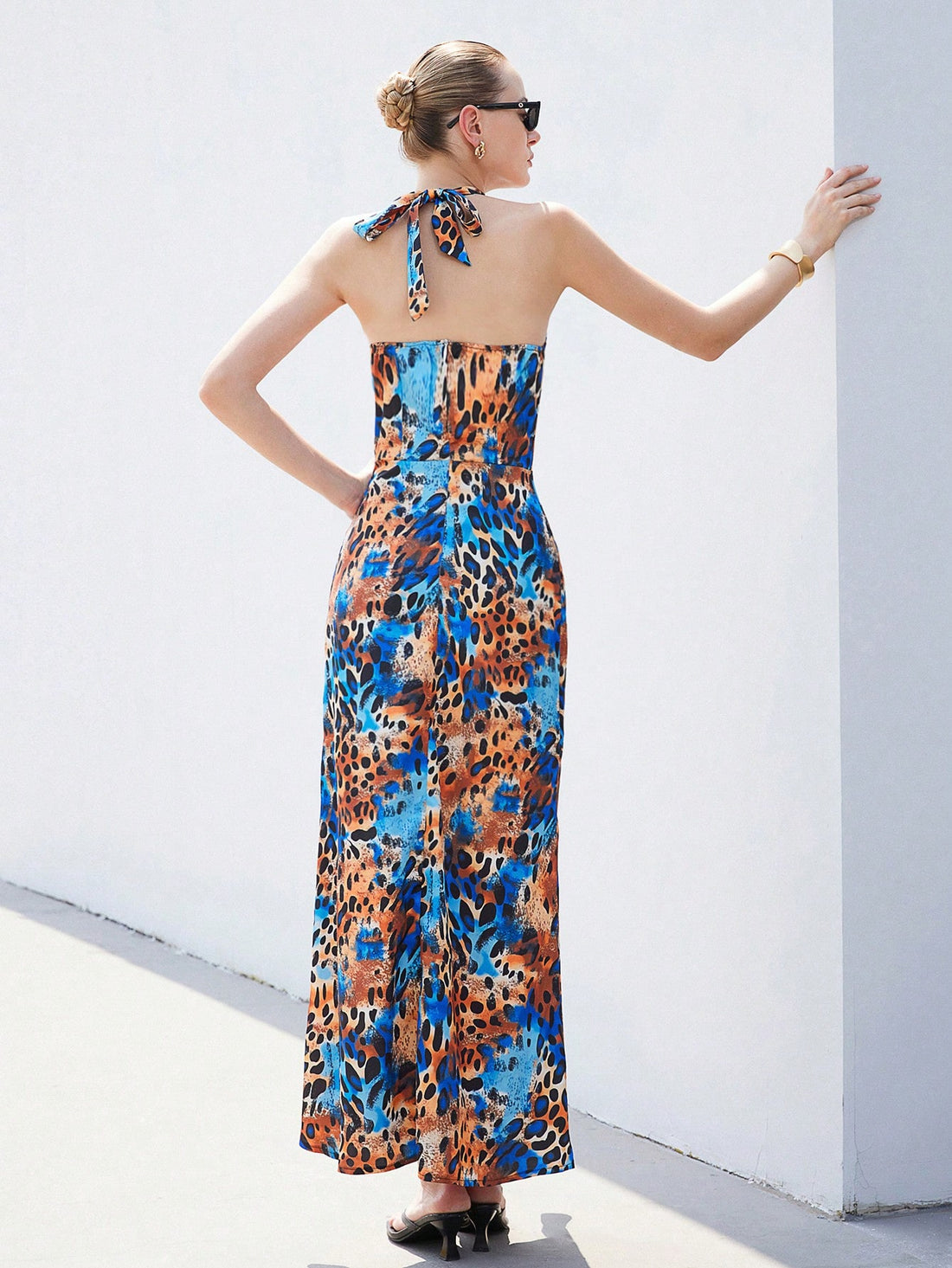 Turn heads effortlessly in this chic leopard print satin long dress. Featuring a stylish stand collar and a cinched waist, it flatters your silhouette while adding a touch of wild sophistication. Perfect for making a bold statement with playful elegance.