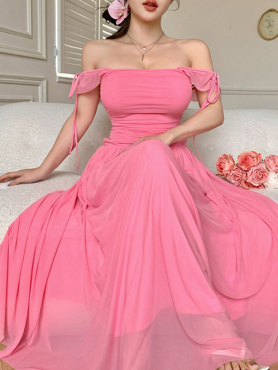 Step into sunshine with this Elegant Off-Shoulder Chiffon Midi Dress, perfect for summer beach holidays. The airy chiffon fabric keeps you cool while the playful off-shoulder style adds a flirty touch. A drawstring waist lets you customize the fit, creating a flattering silhouette that moves with you. Whether you’re strolling the shore or sipping a seaside cocktail, this dress brings effortless charm to your sunny adventures.