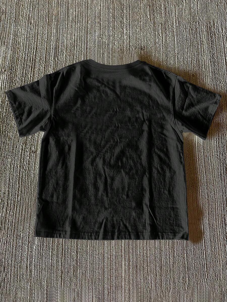 Front view of black women’s Jesus graphic T-shirt with multicolor faith artwork