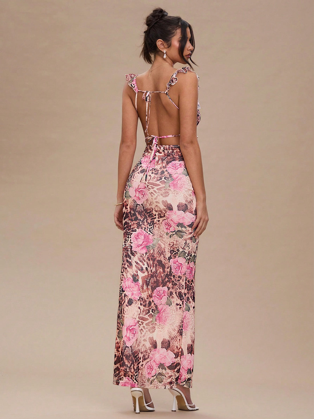 Introducing our must-have Stylish Summer Dress! Featuring a playful leopard and floral pattern, this bodycon dress is perfect for any occasion. The lace trim adds a touch of elegance while the lightweight fabric keeps you cool and comfortable. Turn heads and make a statement this summer.