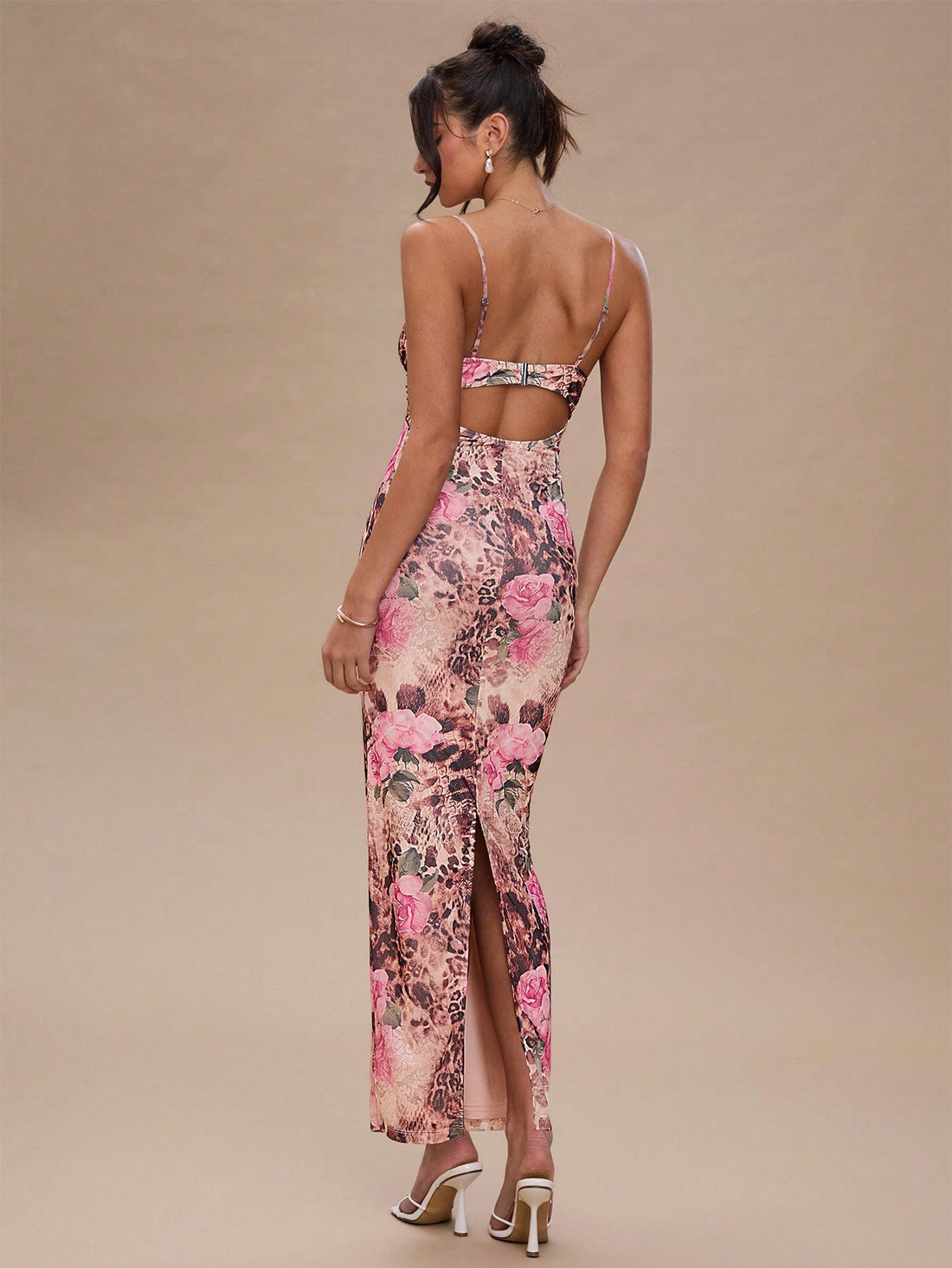 Be the life of the party in this playful and quirky Stylish Pink Floral Leopard Print Bodycon Maxi Dress! Perfect for summer weddings and vacations, this dress is sure to make a statement with its unique print and body-hugging fit. Turn heads and have a blast in this must-have dress!