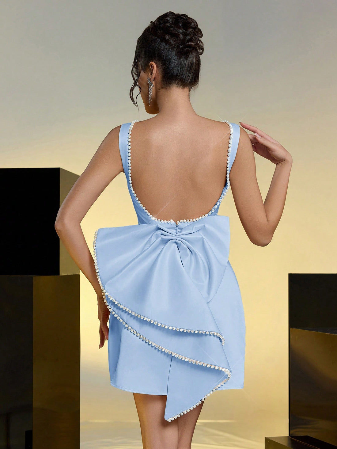 Step into the spotlight with this elegant satin gown, featuring a charming faux pearl chain and a playful bow detail. Designed to dazzle at weddings, parties, and special events, it combines classic sophistication with a fun twist. Feel graceful and confident while turning heads wherever you go!