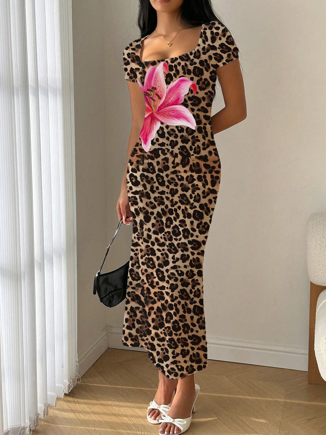 Get ready to unleash your wild side with the Untamed Beauty Leopard Bloom Scoop Neck Bodycon Dress. With its fierce leopard print and mermaid ruffle details, this dress will bring out your inner goddess. Show off your curves and turn heads in this playful and seductive dress. Rawr!