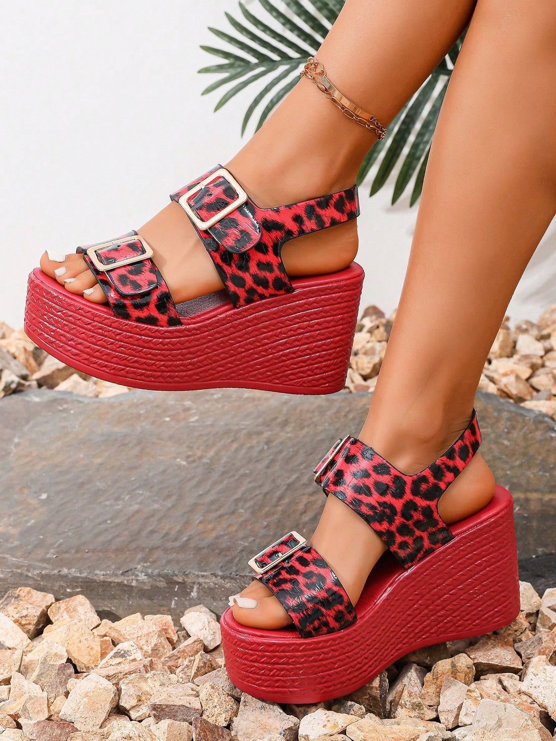 Unleash your inner fashionista with our Chic Leopard Print Red Wedge Platform Sandals. Perfect for summer, these peep toe high heels add a touch of wild to any outfit. Elevate your style with these trendy kicks.