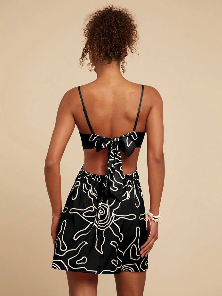 Turn heads this summer with our chic red spaghetti strap dress, featuring a playful sun pattern that brightens your day. The cutout waist adds a flirty touch while keeping you cool and comfortable. Perfect for effortless sunny vibes, this dress is your go-to for warm-weather fun and stylish adventures.