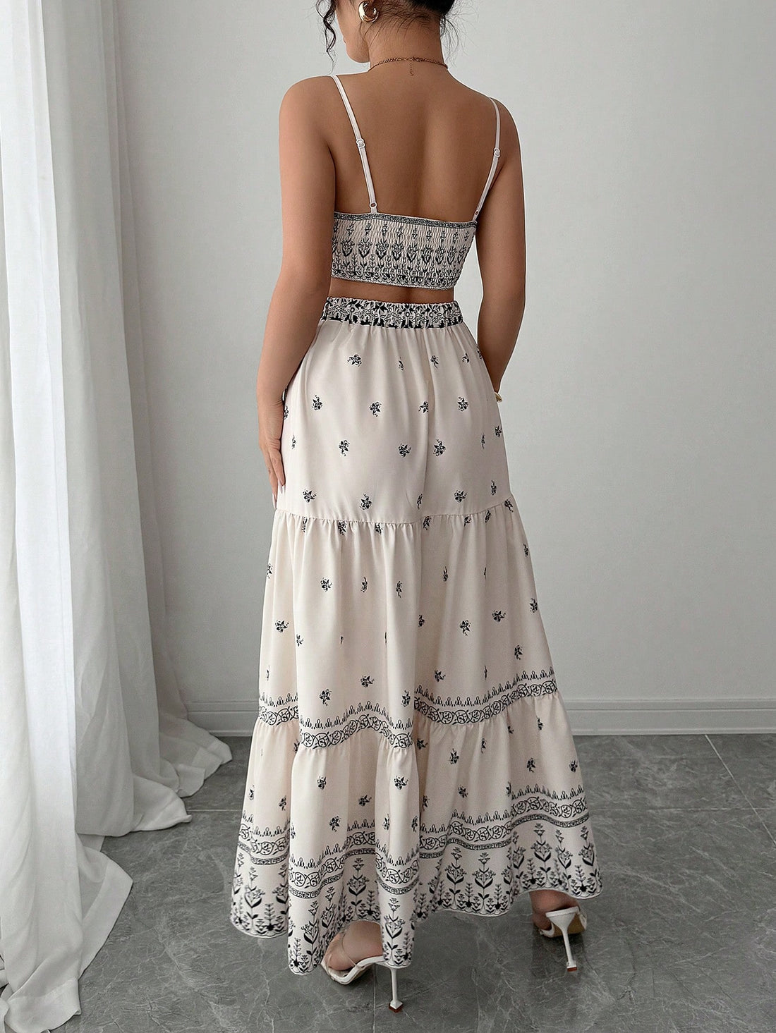 Slip into effortless elegance with this stunning A-line sleeveless dress that's ready for anything. The flattering silhouette skims your curves beautifully, while the eye-catching print design adds personality and flair. A clever hollow waist detail creates visual interest and keeps things fresh. Whether you're heading to holiday celebrations or just living your best everyday life, this versatile piece transitions seamlessly from season to season. Comfortable, chic, and undeniably fun—your new go-to dress a