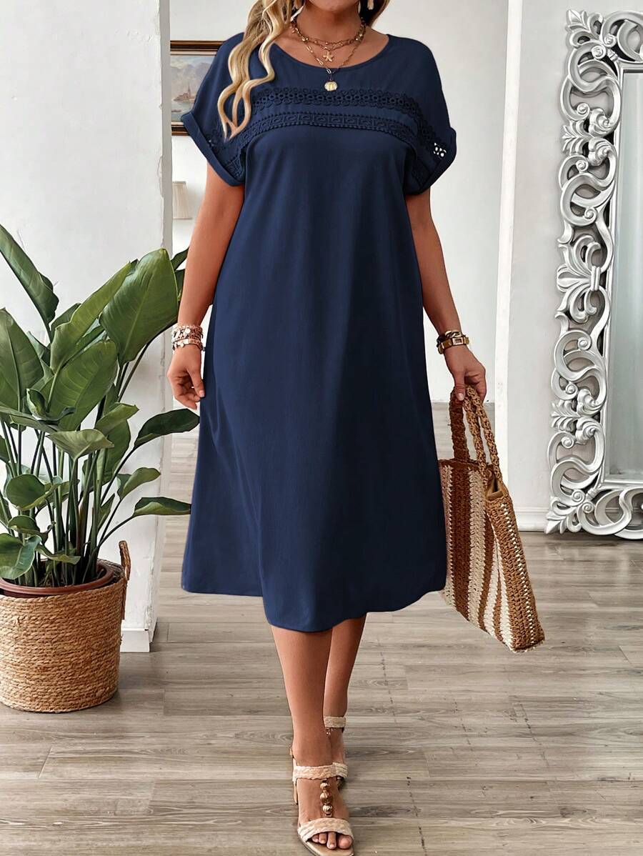 Embrace sunny days in style with this playful plus size summer pullover dress. Featuring delicate lace details and a relaxed drop shoulder design, it offers breezy comfort and a flirty touch. Perfect for casual outings or weekend fun, this dress keeps you cool while celebrating your curves with effortless charm.