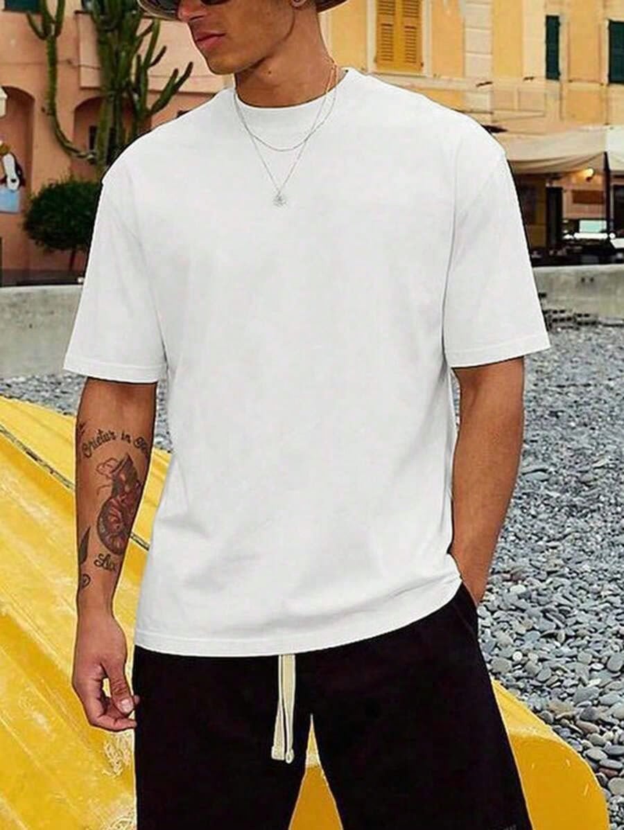 Make a statement with this eye-catching Alphabet Geometric Graphic Print T-Shirt! Perfect for guys who want to add some pizzazz to their spring and summer wardrobe. The bold design turns heads while the comfortable fit keeps you cool during casual outings. Pair with jeans, shorts, or chinos for an instantly stylish look that says "I don't take fashion too seriously, but I still look awesome!"