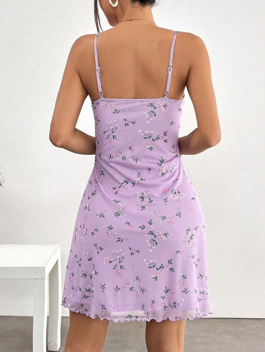 Stay cool and stylish this summer in our Chic Ditsy Floral Cami Dress with Lettuce Trim. The playful print and flirty lettuce trim effortlessly elevate any outing. Embrace effortless style and stay cool all season long.