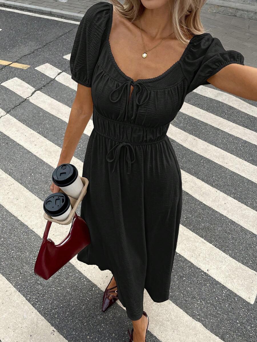 Step into summer with this playful and chic casual dress featuring puff sleeves and a trendy tie-front detail. Its solid color design makes it easy to mix and match, while the flattering silhouette keeps you comfortable and stylish all day long. Perfect for sunny days, brunch dates, or casual outings, this dress adds a fun, flirty touch to your warm-weather wardrobe.