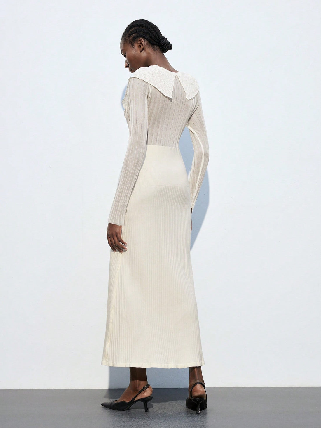 Elevate your everyday style with this charming A-line sweater dress that effortlessly transitions from office to evening. The delicate ruffle trim adds a touch of whimsy and sophistication, while the flattering silhouette celebrates your curves with grace. Crafted for comfort and versatility, this dress pairs beautifully with boots, sneakers, or heels—making it your go-to piece for brunch dates, casual Fridays, or those moments when you want to feel polished without trying too hard. A wardrobe essential tha