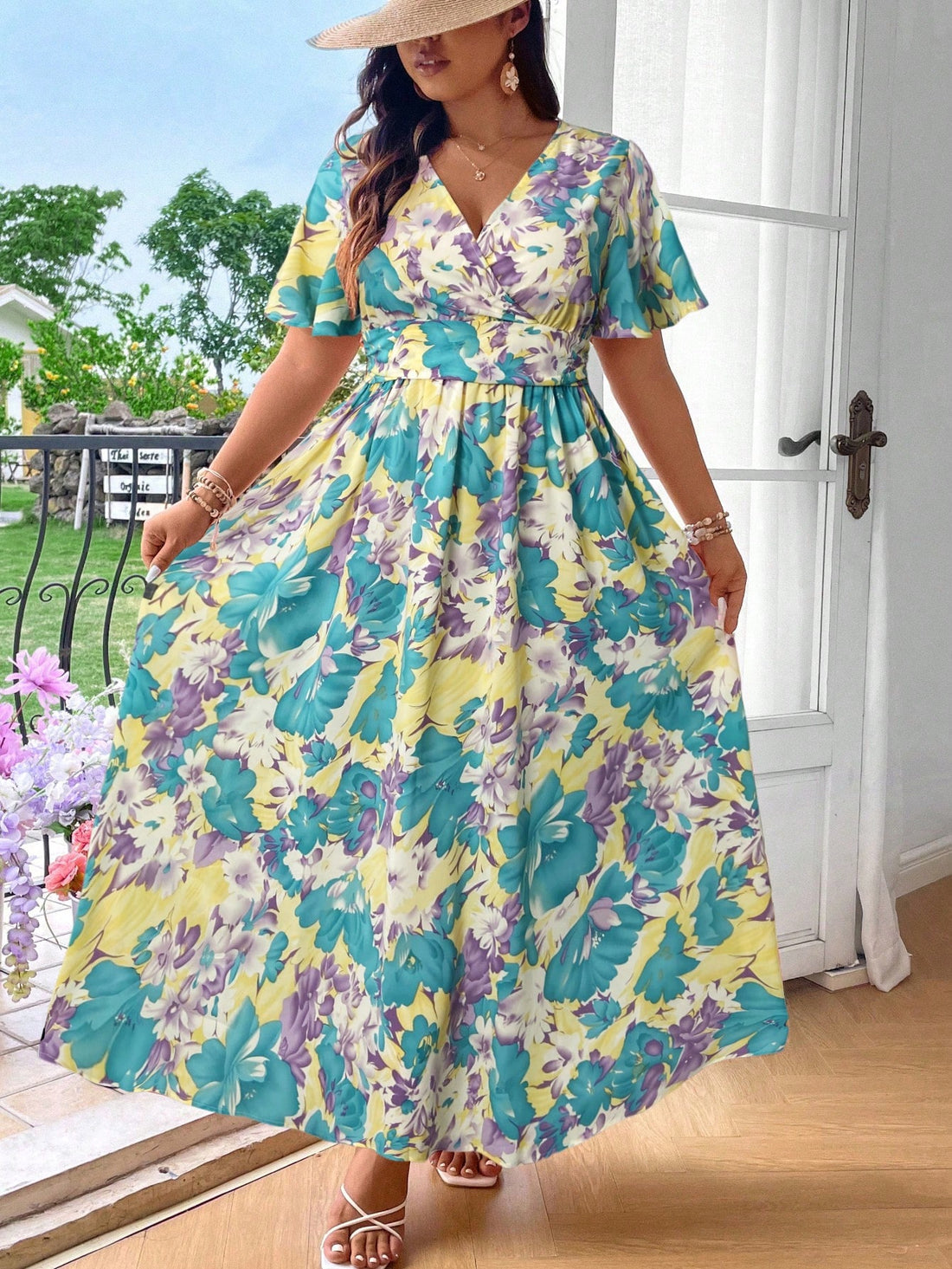 Embrace summer vibes in this gorgeous plus size floral maxi dress! The playful ruffle sleeves add a flirty touch while the flowing silhouette keeps you cool and comfortable. Perfect for beach strolls, resort dinners, or any vacation adventure where you want to turn heads. Pack this versatile stunner and be ready for whatever your getaway brings!