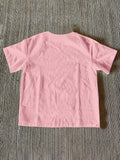 Back view of baby pink short sleeve crew-neck T-shirt with plain finish