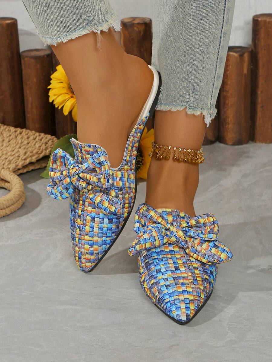 Step into style and comfort with our Elegant White Bow Flat Mules. The elastic band provides a snug fit while the bow adds a touch of elegance. Versatile for both spring and autumn, these mules are the perfect addition to your wardrobe. (Your feet will thank you!)