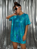 Teal holographic oversized T-shirt mini dress angled front view for festival styling