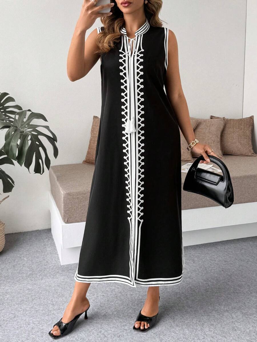 Step out in style with this Trendy Plus Size Minimalist Geometric Sleeveless Spring Dress. Its clean lines and bold geometric patterns bring modern charm, while the long slit adds a flirty touch perfect for warmer days. Light and breezy, it’s designed to keep you comfortable and confident all season long.