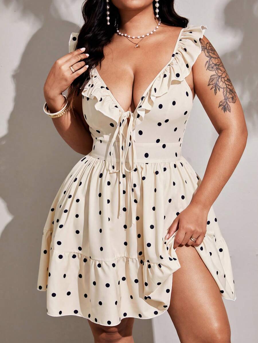 Step out in style with this Elegant Plus Size Polka Dot Chiffon Maxi Dress. Featuring a flirty deep V-neck and a playful ruffle hem, it combines comfort and charm effortlessly. The lightweight chiffon fabric drapes beautifully, making it perfect for twirling at any occasion. Embrace your curves with confidence and a touch of fun!