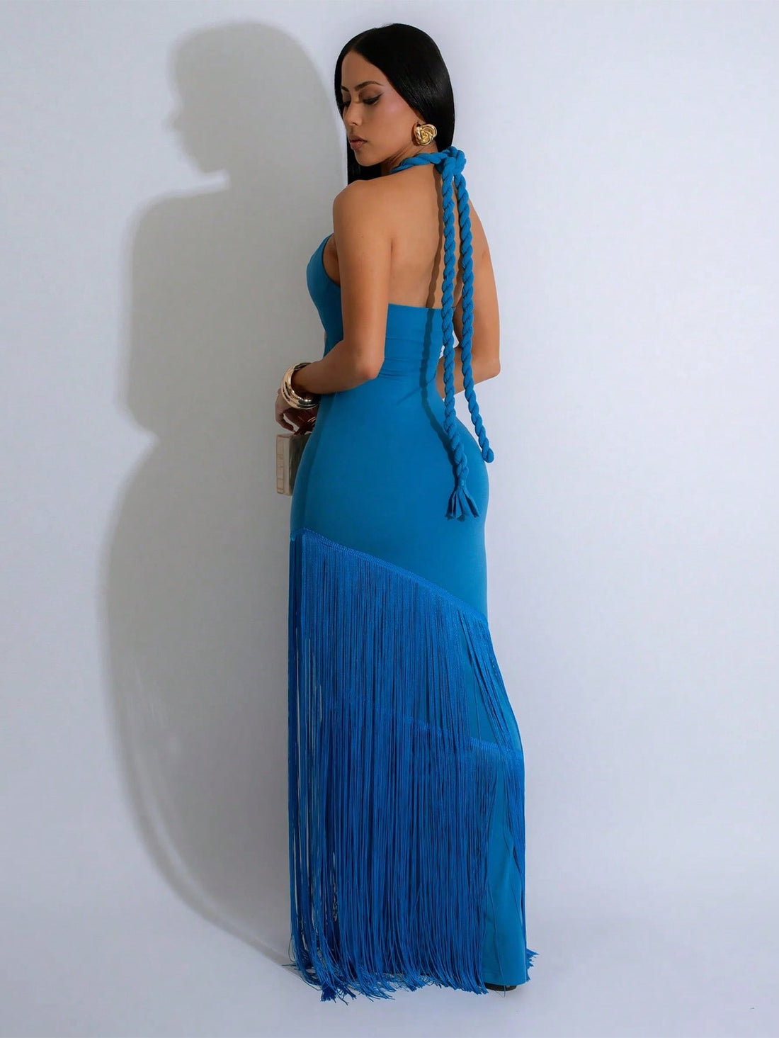 Turn heads at your next event with this Elegant Blue Fringed Cocktail Party Dress. Its fitted design hugs your silhouette, while playful fringe details add movement and flair. Perfect for dancing the night away or making a stylish statement, this dress combines elegance with fun in every step.