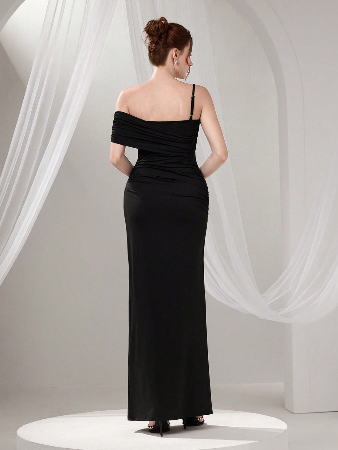 Slip into sophistication with this stunning asymmetrical neck maxi dress that's ready to turn heads at your next big event. The graceful draped neckline creates an effortlessly chic silhouette, while intricate beading adds just the right amount of sparkle and glamour. Whether you're celebrating a graduation or dancing the night away at a cocktail party, this dress delivers elegance with a fun, flirty edge. The flowing maxi length flatters every figure and moves beautifully with you. A timeless piece that pr
