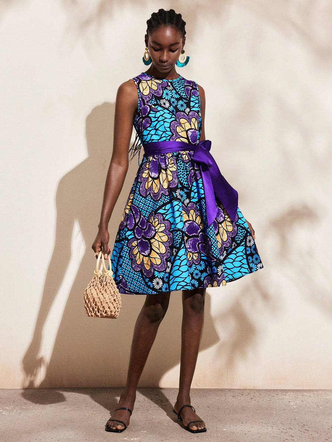 Step into style with our Ankara Print A-Line Dress! Perfect for any occasion, this dress features a trendy Ankara print and a flattering A-line silhouette. Whether you're going casual, attending a wedding, or jetting off on vacation, this dress has got you covered (literally). Time to turn heads with our stylish dress!