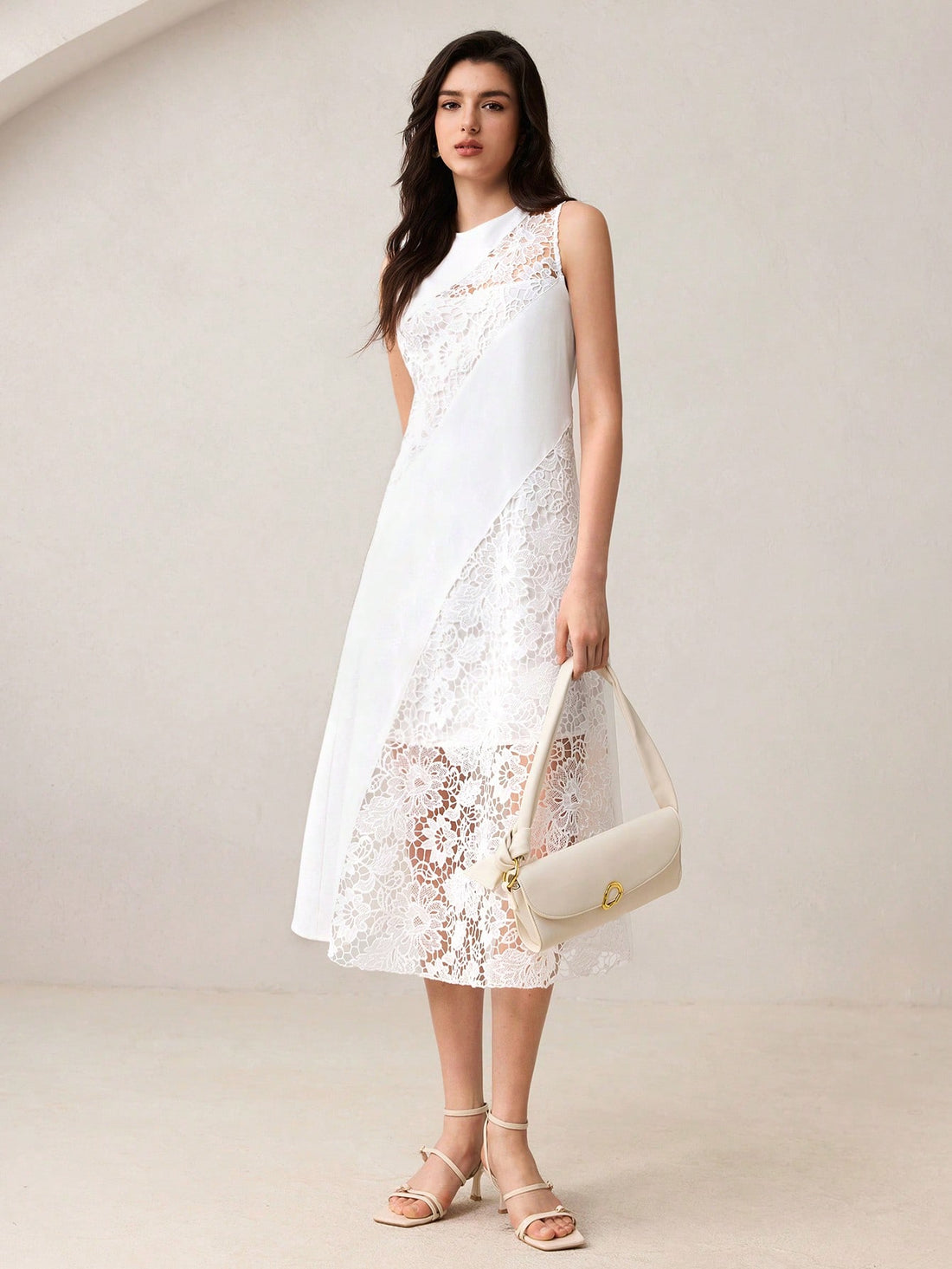 Step into charm with this elegant white long sleeveless dress, designed to brighten your workdays, weddings, and vacations alike. Featuring delicate French lace patchwork, it adds a touch of whimsy and sophistication to your look. Light and breezy, this dress keeps you comfortable while turning heads wherever you go. Perfect for those who love to blend classic style with a playful twist!