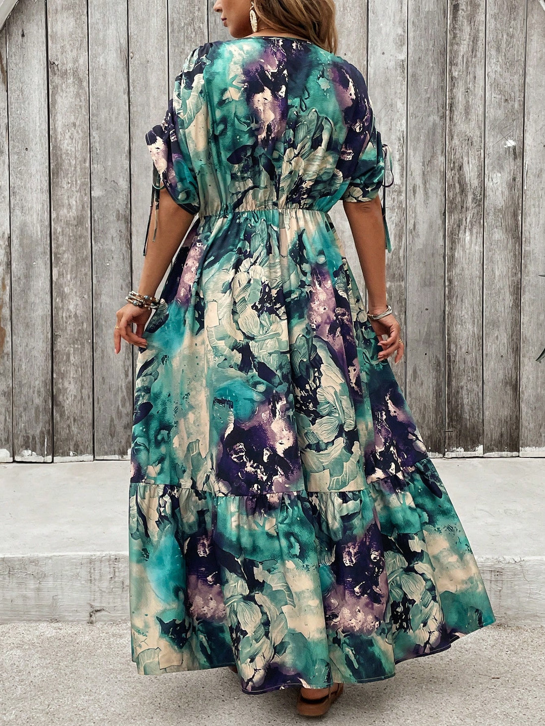 Embrace your curves in this playful floral V-neck batwing dress! The breezy silhouette flatters your figure while the vibrant print turns heads at summer parties and vacation getaways. Effortlessly transition from beach days to dinner dates with this versatile plus-size stunner that combines comfort and style in one fabulous package.