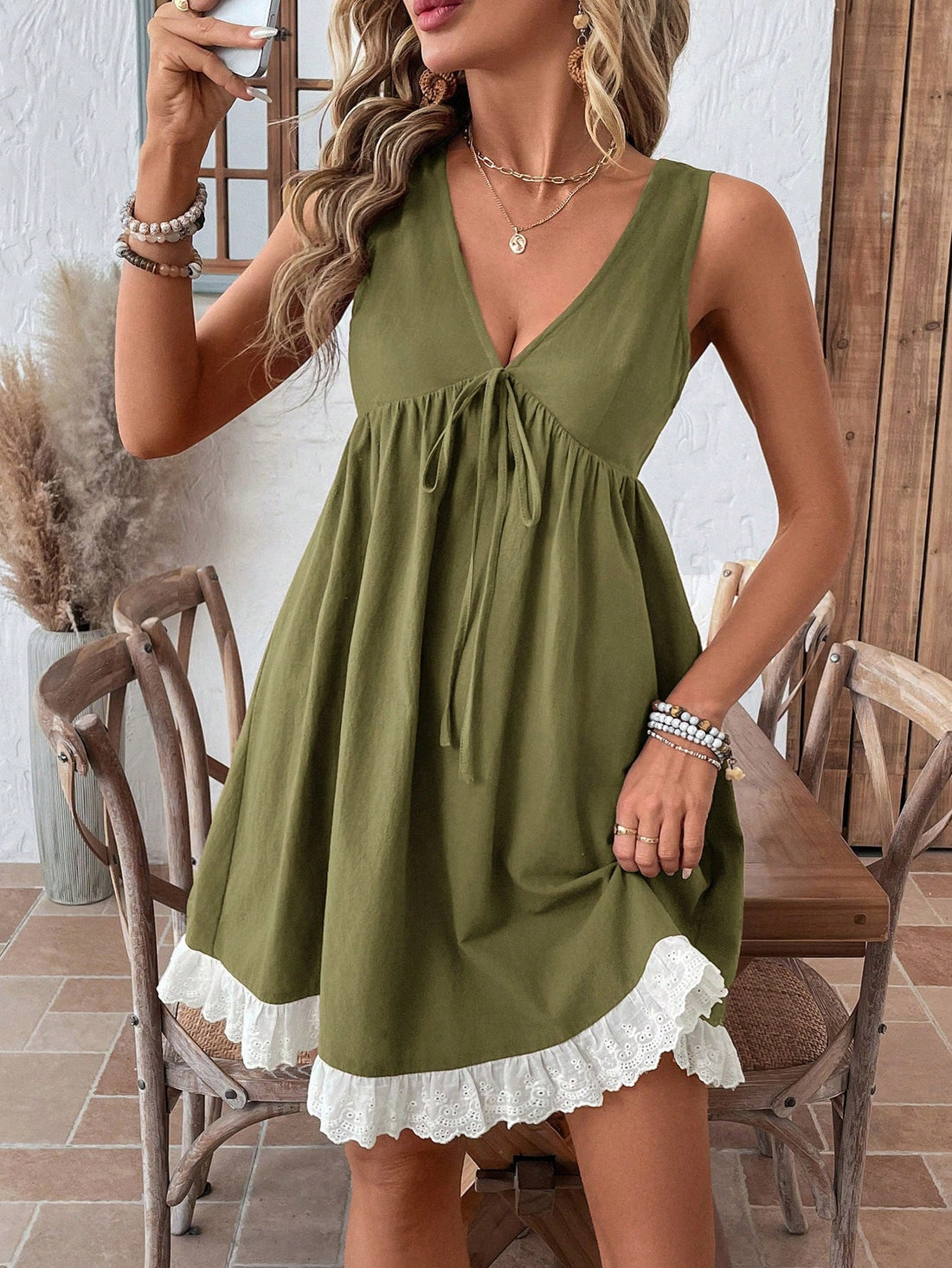 Effortlessly turn heads with our Charming V-Neck Mini Babydoll Dress! This dress not only offers effortless style, but also ensures maximum comfort. Its playful v-neck and mini length adds a touch of charm to any outfit. Perfect for any occasion.