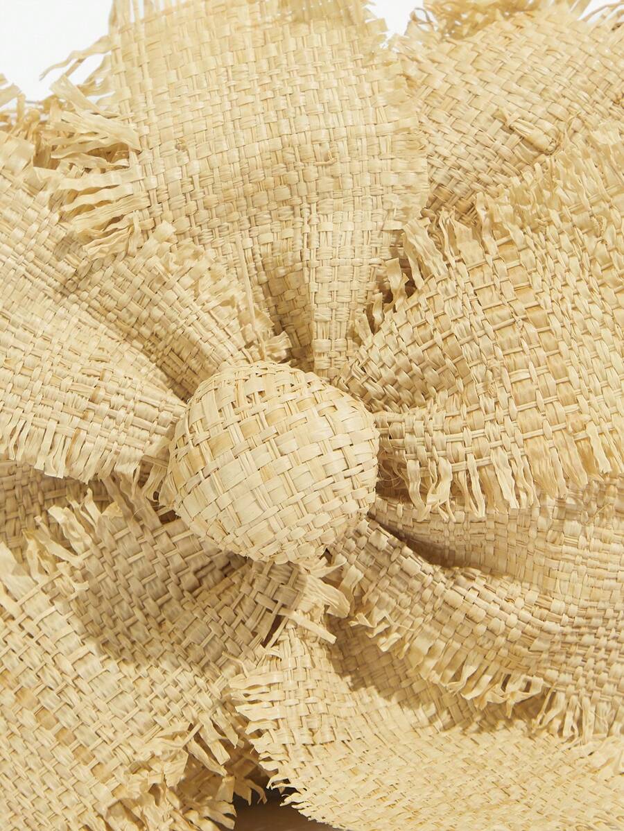 Mini box bag silhouette with raffia texture and floral accent