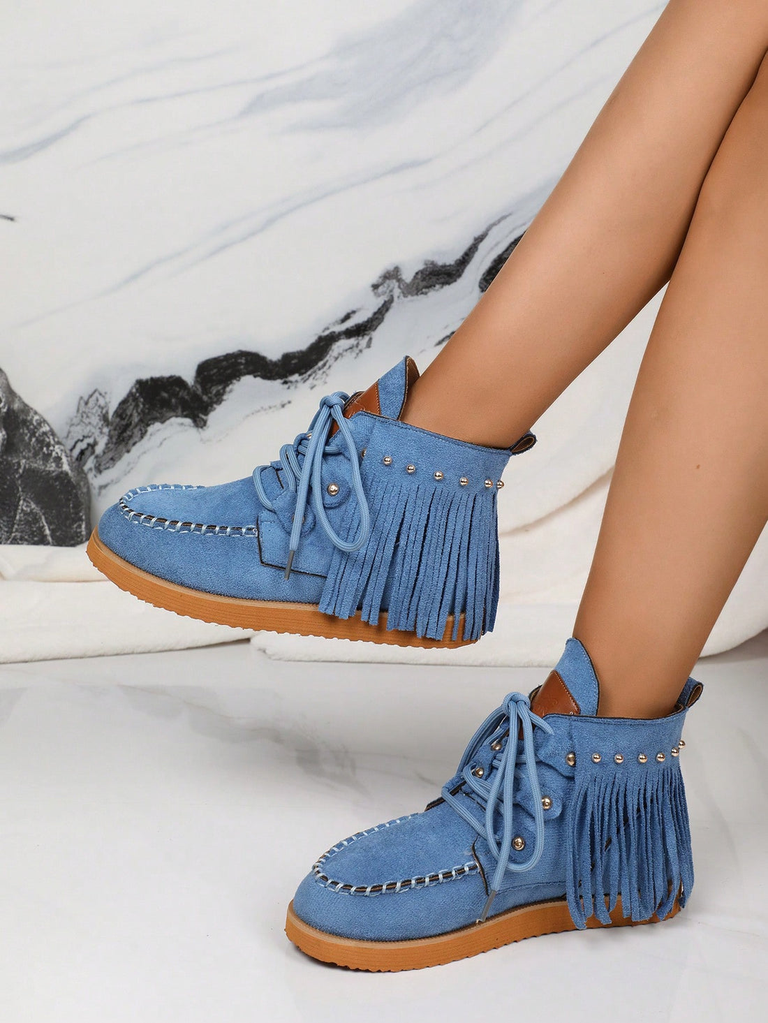 Step into fun and flair with these Lightweight Blue Fringe Ankle Boots! Designed for everyday adventures, their comfy lace-up style keeps your feet happy while the playful blue fringe adds a splash of personality. Perfect for any season, these flats easily match your casual looks and keep you light on your feet from spring strolls to autumn outings. Add a dash of whimsy to your wardrobe with boots that blend style and ease effortlessly!