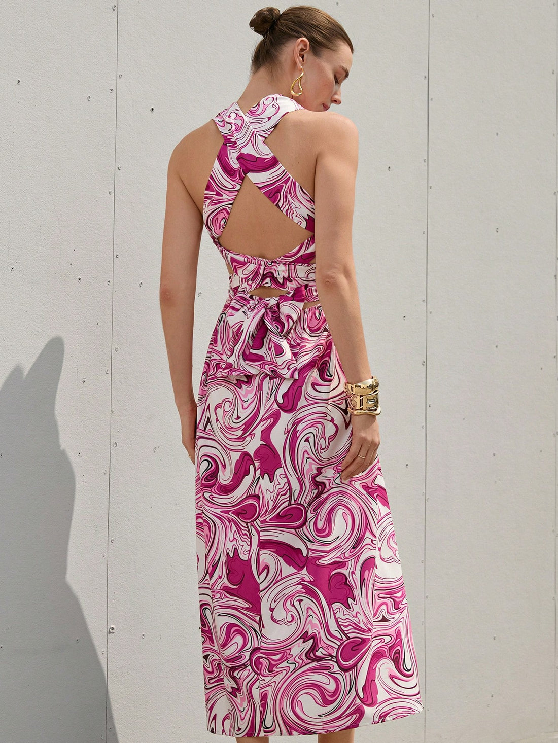 Step out in style with this playful pink and purple tie-dye backless dress. The halter neckline adds a flirty touch, perfect for casual days or chic evenings. Lightweight and breezy, it’s designed to keep you comfortable while turning heads wherever you go. Embrace fun fashion with a dress that’s as vibrant and lively as you are!