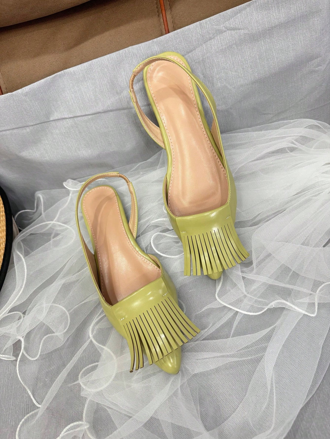 Step out in style with these Elegant Women's Ankle Strap Flat Shoes, featuring a charming tassel design that adds a fun twist to any outfit. Perfect for all seasons, their comfortable flat sole keeps you light on your feet while the ankle strap ensures a secure fit. Whether you're heading to brunch or a casual day out, these shoes bring a playful touch to your look with effortless chic.