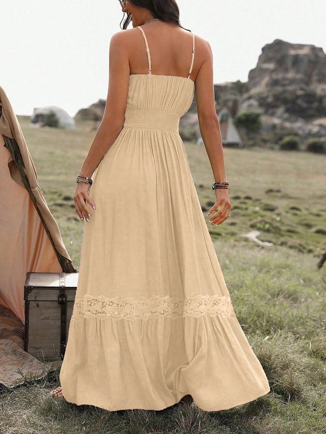 Step into summer with this playful Women's Lace Ruffle Hem Cami Dress. Its flowing maxi length and delicate lace details create a breezy, chic look perfect for beach vacations or sunny days out. The ruffled hem adds a flirty touch, while the cami straps keep it light and comfortable. Embrace effortless style and let your summer adventures begin!