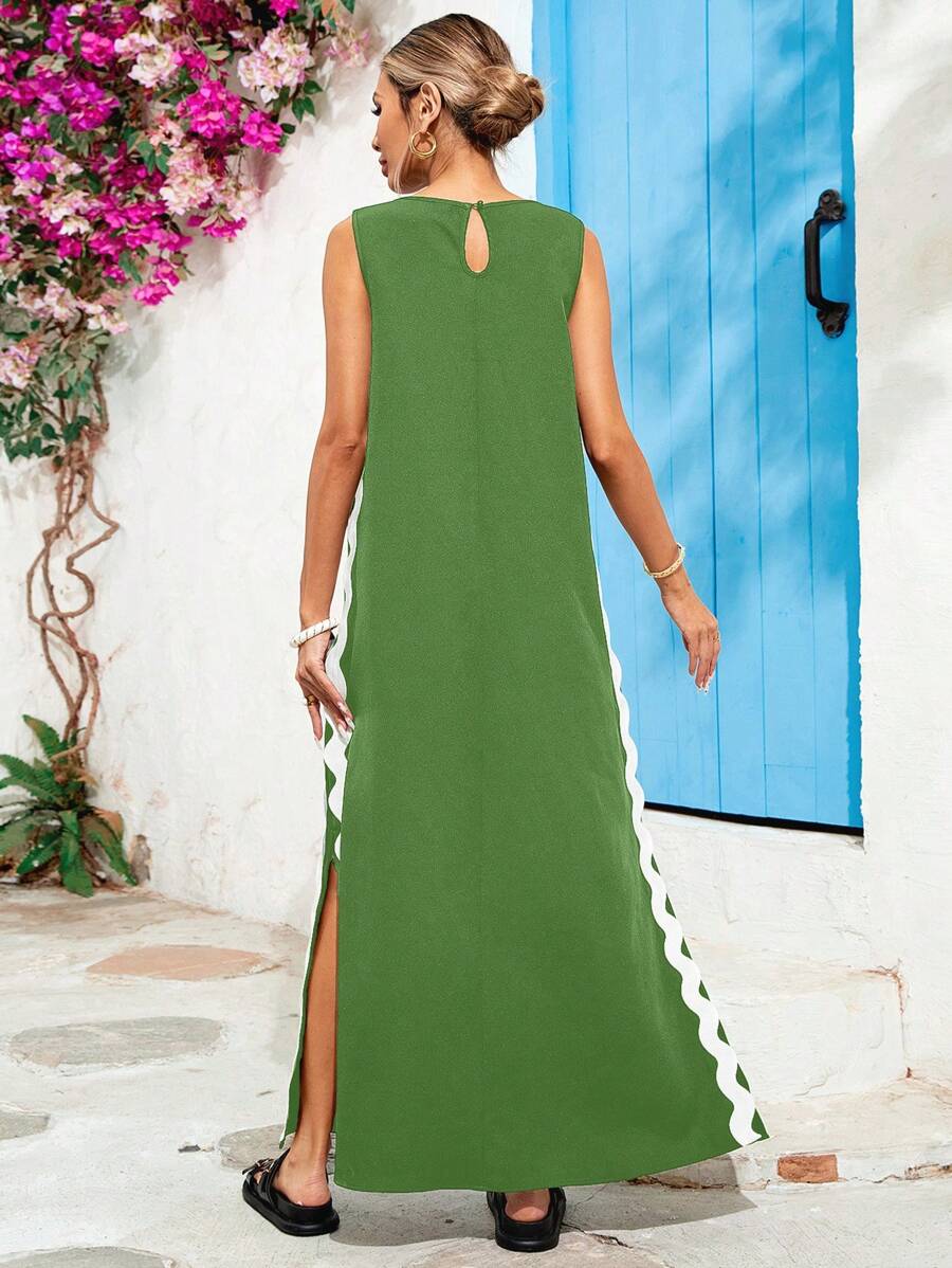 Introducing our playful and stylish Women's Sleeveless Lace Hem Dress! Perfect for summer fashion, this dress features a fun lace hem and comes in a solid color to add a touch of quirk to any outfit. Stay cool and trendy with this must-have dress.