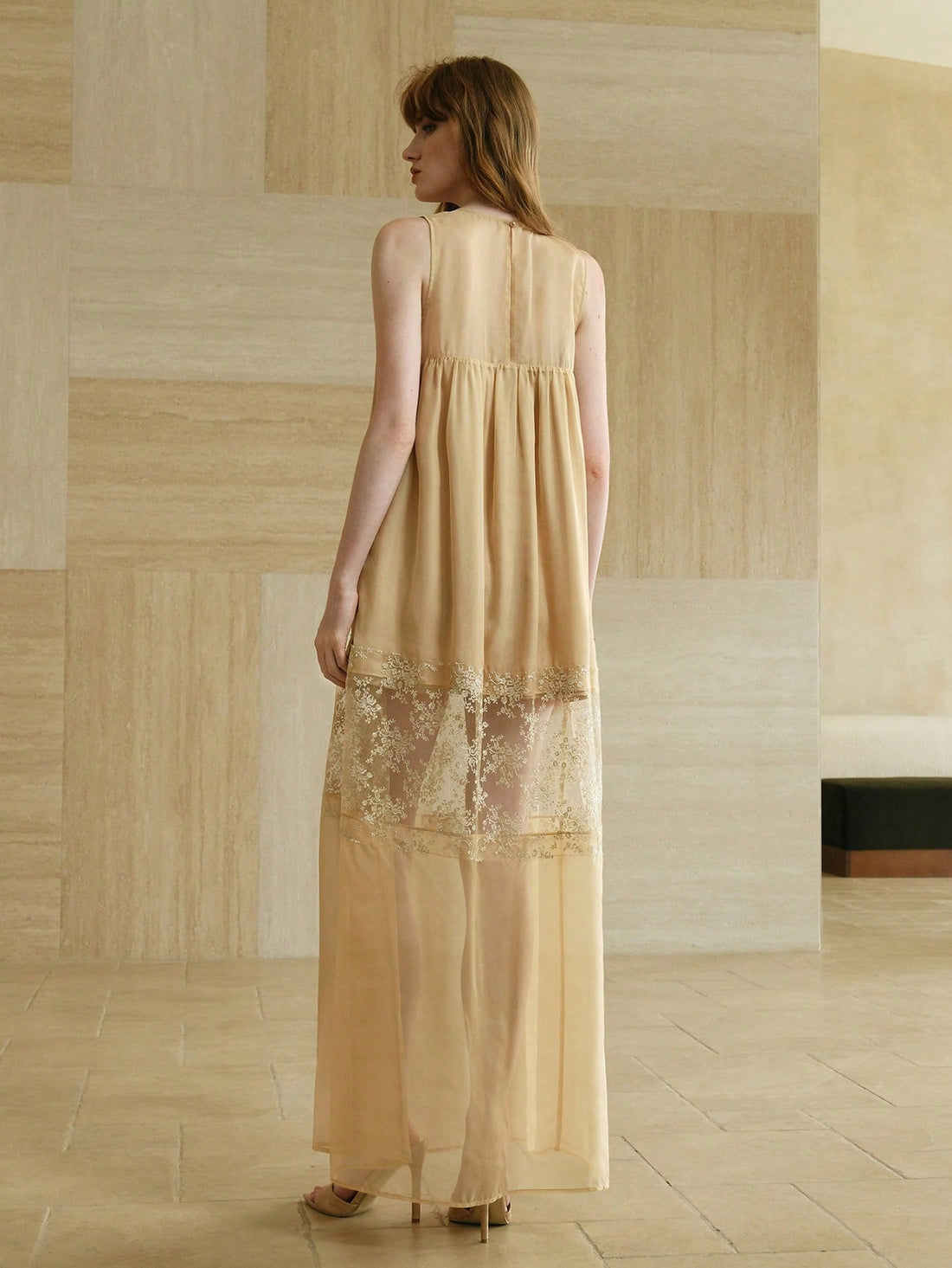 Step into summer with this playful maxi dress featuring delicate lace patchwork and airy mesh panels. Its sleeveless design keeps you cool while adding a flirty touch, making it the perfect companion for beach vacations or sunny strolls. Embrace effortless style and comfort wherever your adventures take you!