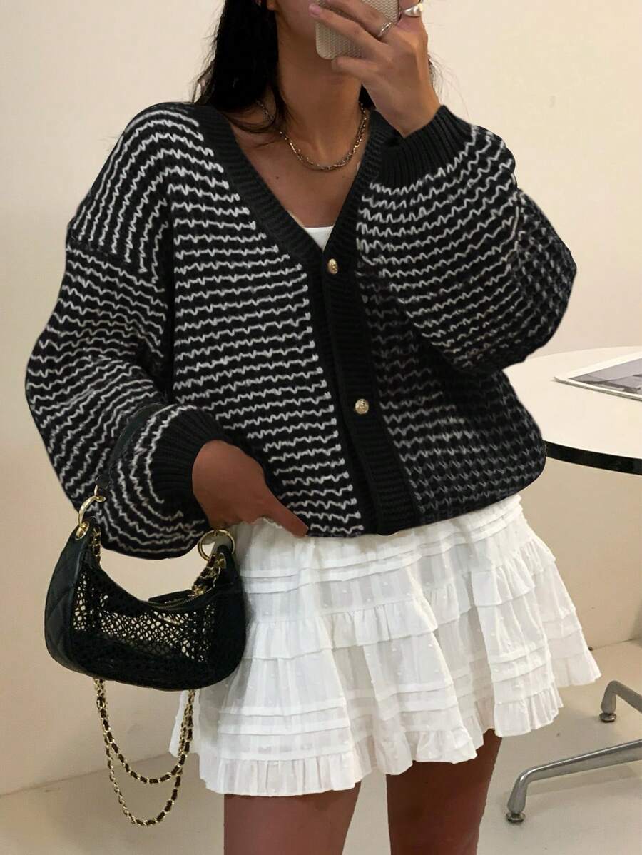 Back view of Women’s Plaid V-Neck Button-Up Cardigan for Effortless Style and Comfort loose drop shoulder fit