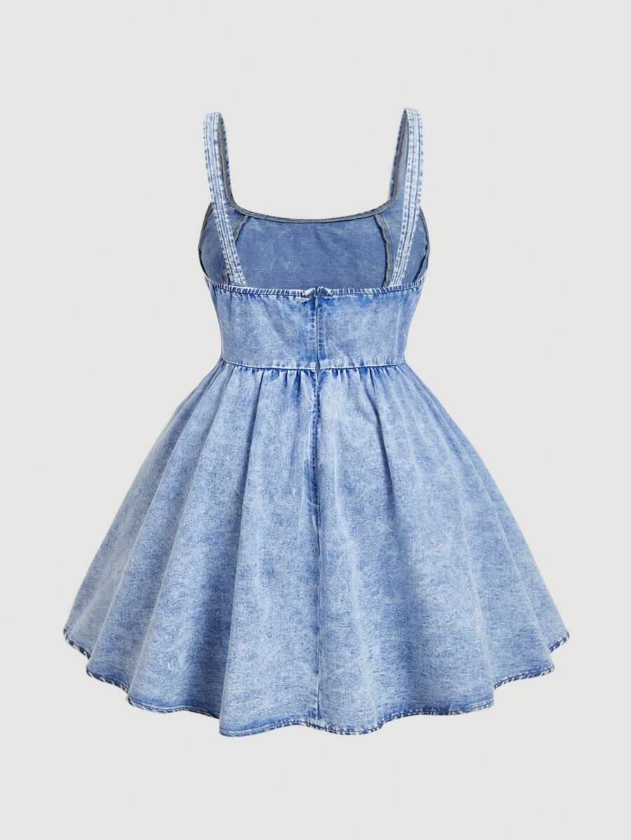Front view of light wash denim cami mini dress with flared skirt